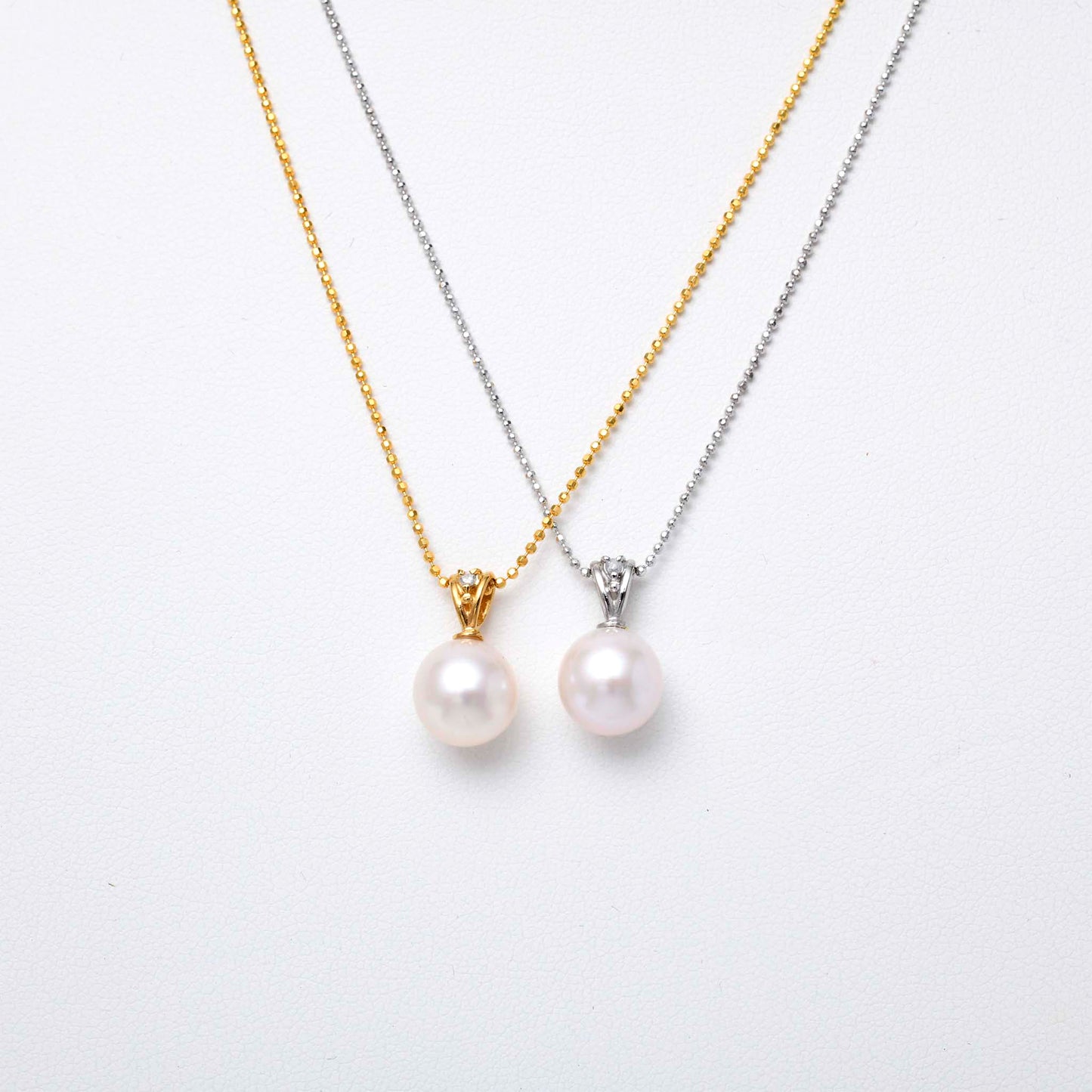 Akoya pearl 9mm bead pendant 1 diamond